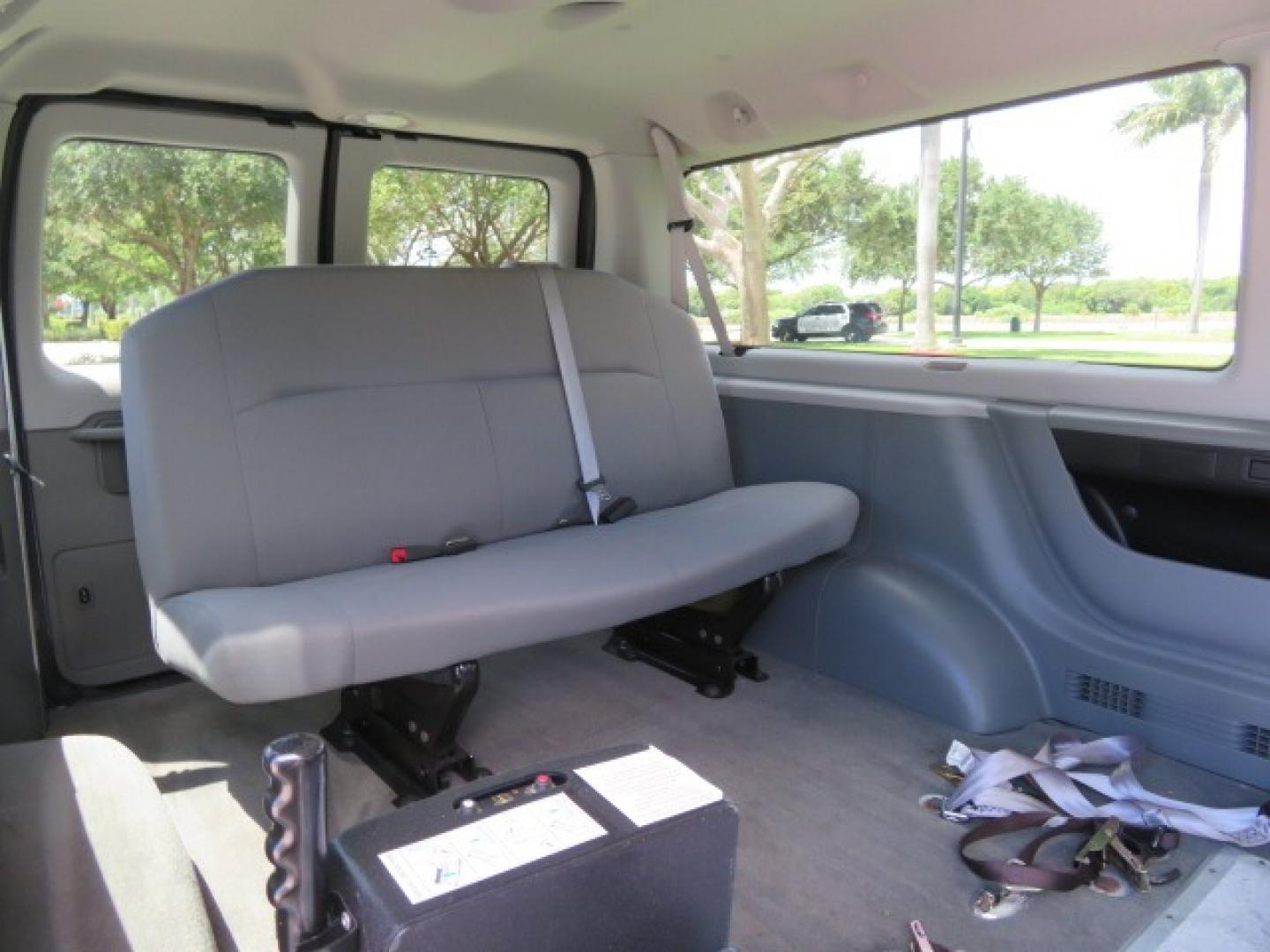 2013 Dark Blue /Gray Ford E-Series Wagon XLT (1FMNE1BW4DD) with an 4.6L V8 engine, Automatic transmission, located at 4301 Oak Circle #19, Boca Raton, FL, 33431, (954) 561-2499, 26.388861, -80.084038 - You are looking at a Gorgeous 2013 Ford E150 XLT Handicap Wheelchair Conversion Van with 22K Original Miles, Tie Down System, Power Electric VMI Side Entry Wheelchair Lift, Back Up Camera, Factory Navigation and Much Much More. This van is Awesome. This is a Nice Rust Free Van with a Clean Carfax, C - Photo#64